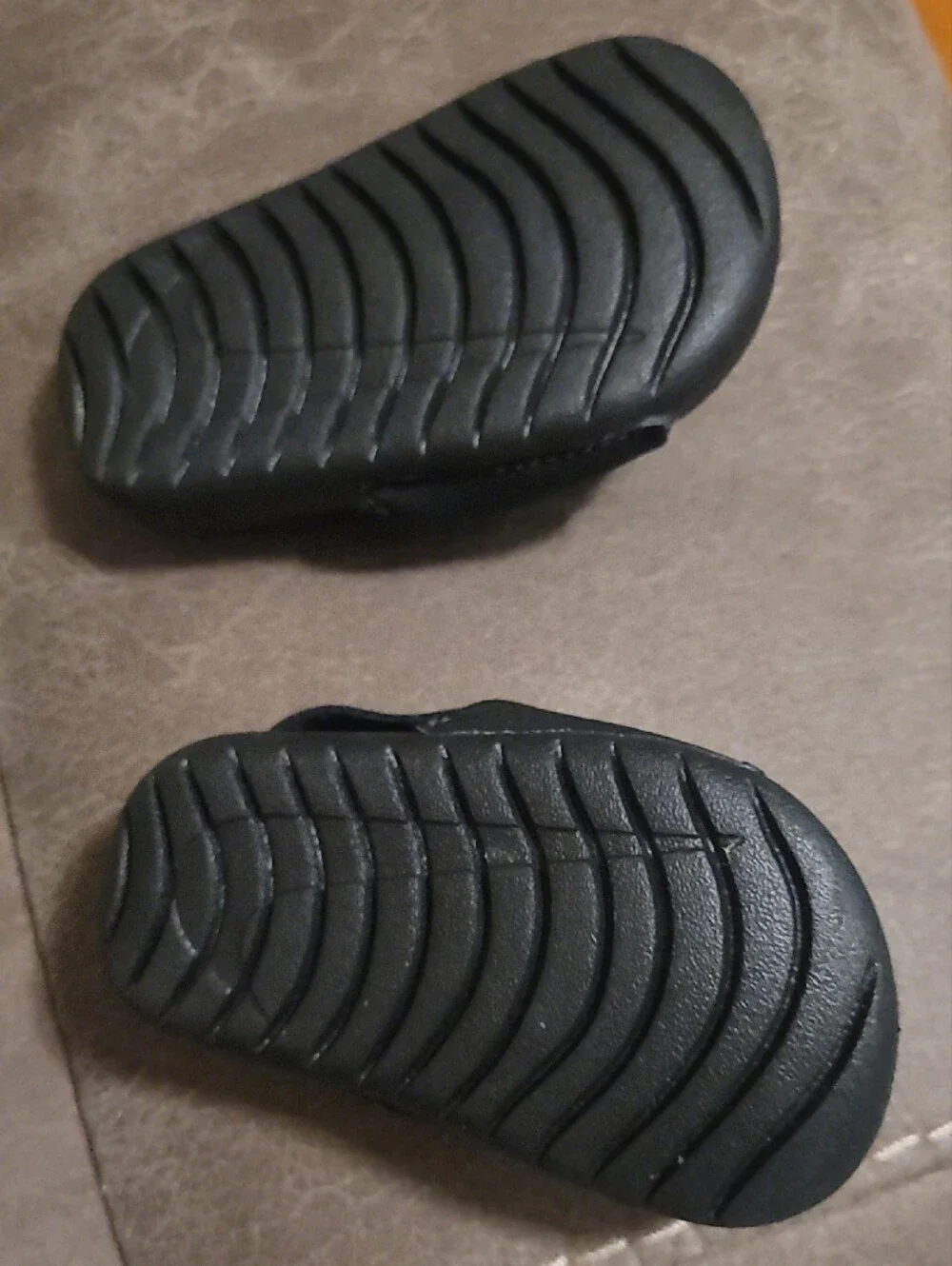 Nike Kids Black Slide Sandals with White Swoosh Accent